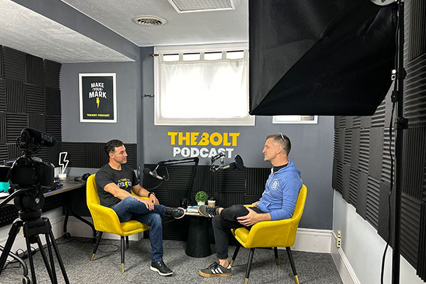 The BOLT podcast studio photo Todd Bertsch host with guest